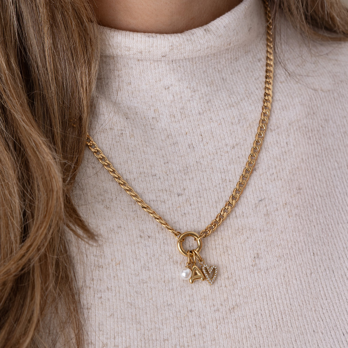 Aura charm letter gold